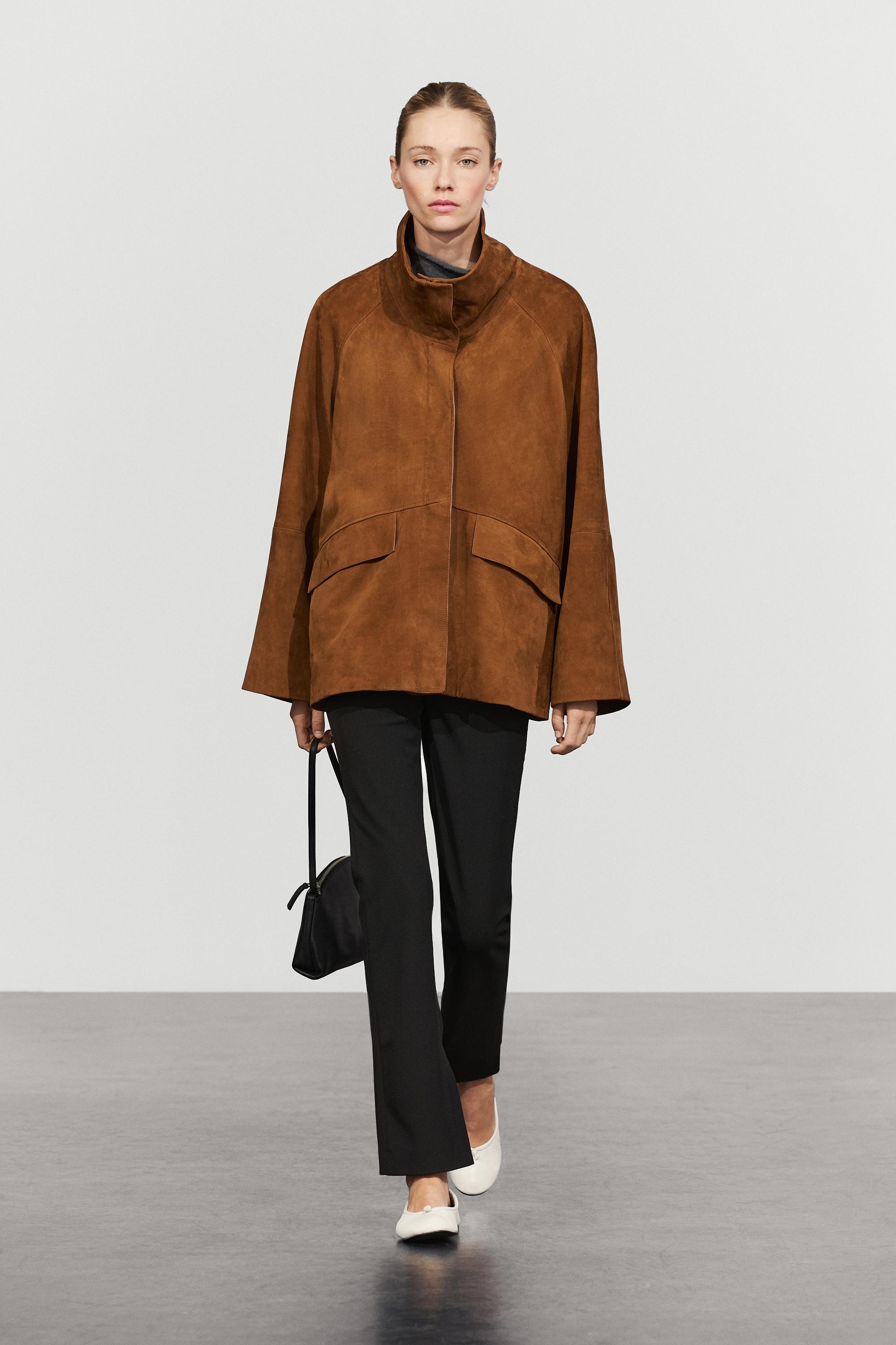 Manteau col montant en cuir nubuck